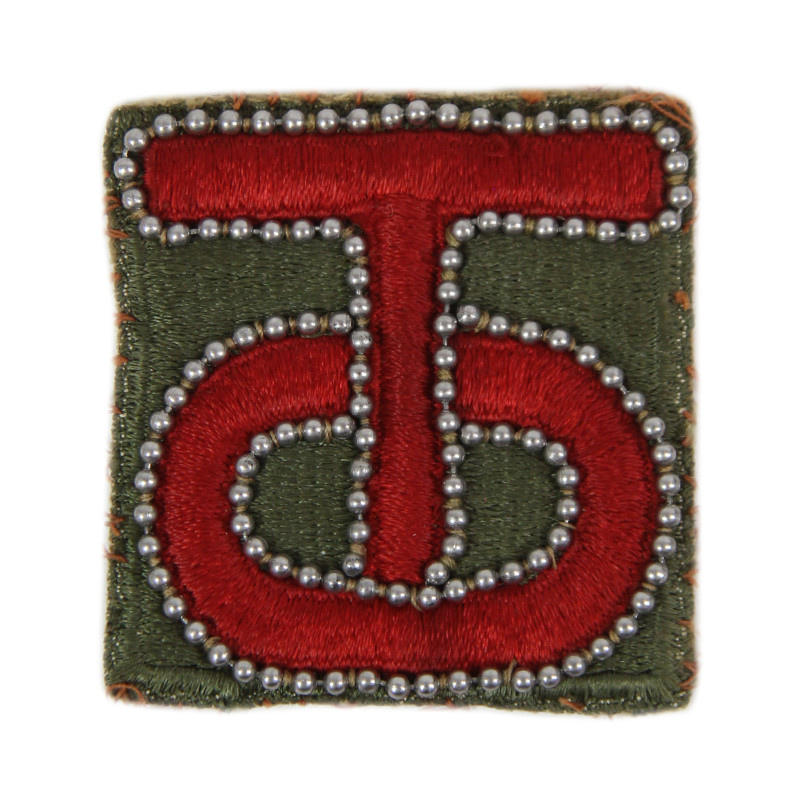 Insigne, 90th Infantry Division, orné d'une chaînette de Dog Tag